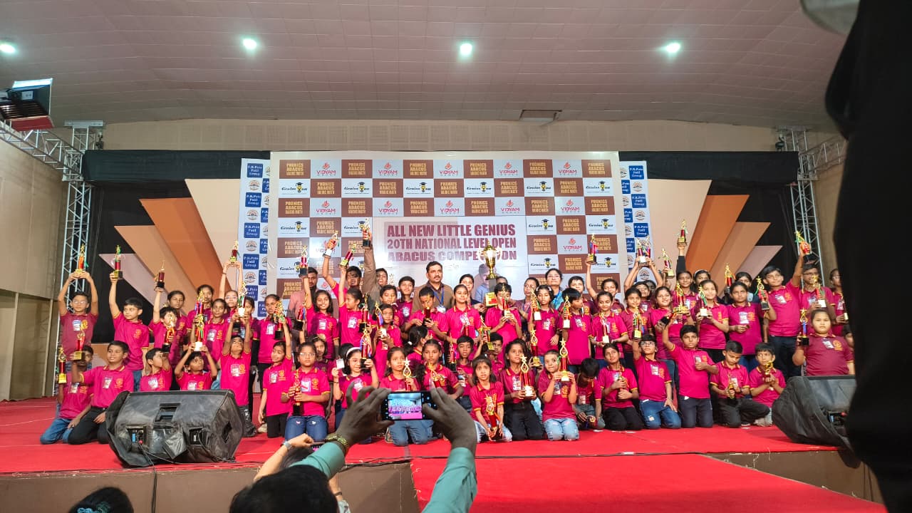 Genius Kids Academy students with trophies at 20th National Level Abacus Competition stage