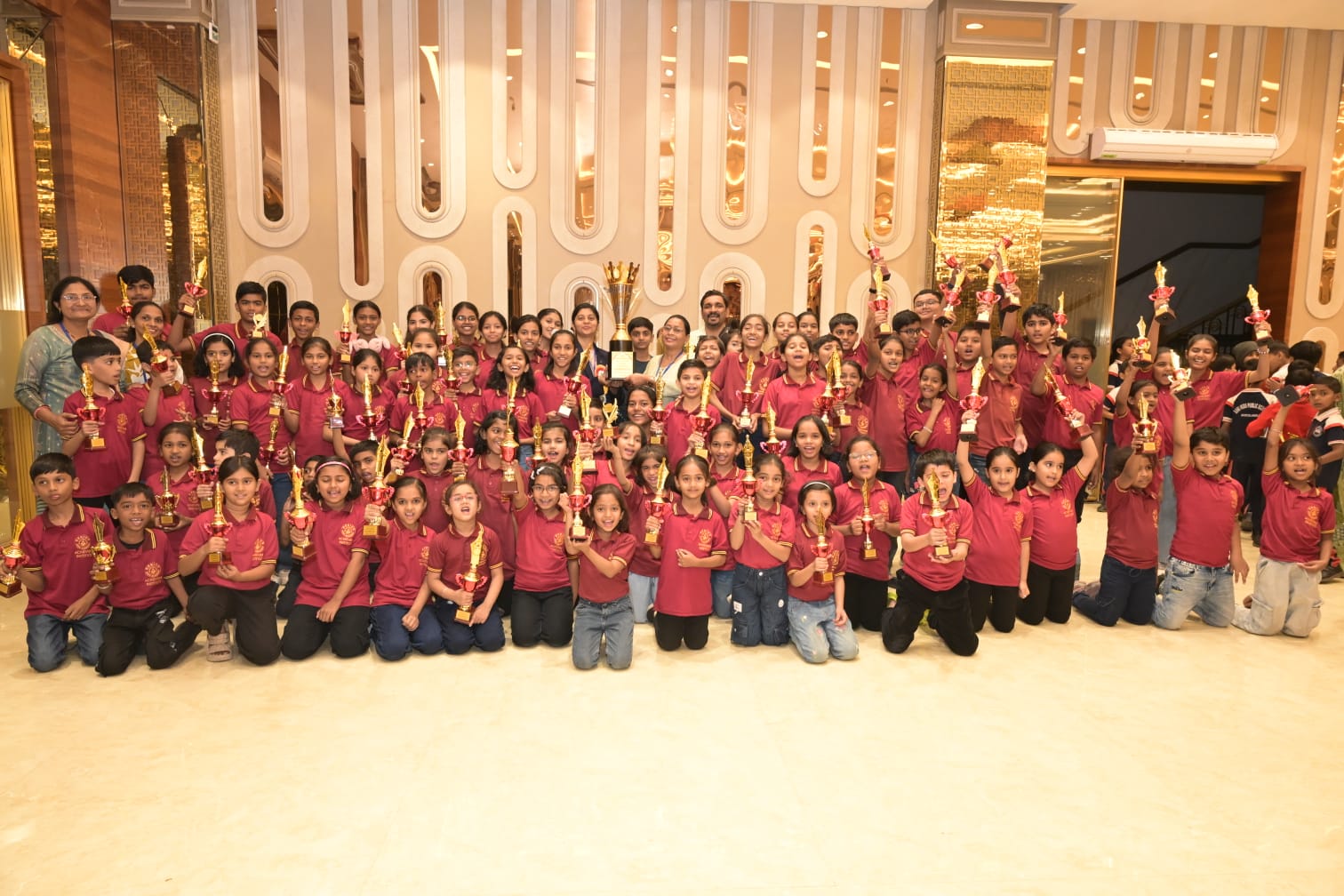 75+ Genius Kids Academy students with trophies at International Abacus Competition Wardha